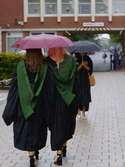 and then it rained.  Maddie and Millie walking back to the studio spaces for some food.